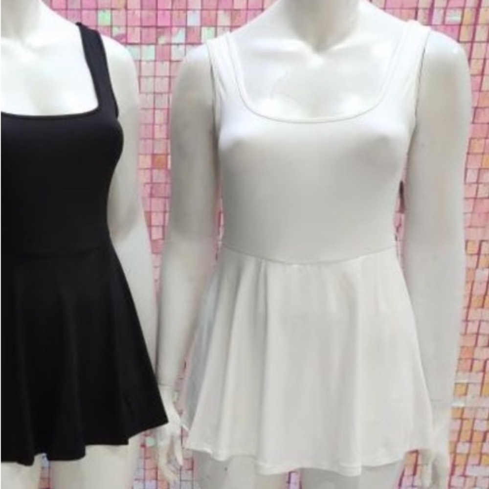 White Sleeveless Dresses